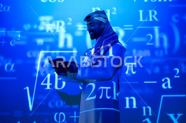 Using modern technologies, integrating science with technology, numbers and calculations in mathematics, a Saudi Gulf Arab man wearing a traditional thobe and shemagh holding a tablet in his hand, scientific and technical development in the Kingdom of Saudi Arabia, a blue background for mathematical laws and equations