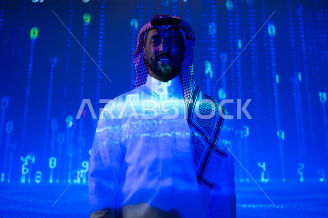 Gestures of pleasure and pride, digital and technological development in the Kingdom of Saudi Arabia, international programming languages, use of advanced codes and algorithms, a Saudi Gulf Arab young man wearing a traditional dress looking at the camera, a three-dimensional holographic background for the illuminated numbers