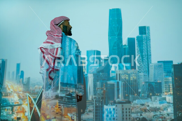 Residential and commercial towers and skyscrapers at night, urban growth and development in the Kingdom of Saudi Arabia, a Saudi Gulf Arab man wearing a traditional dress standing in front of famous tourist attractions, the King Abdullah Financial Center CAFD, financial economic buildings and facilities