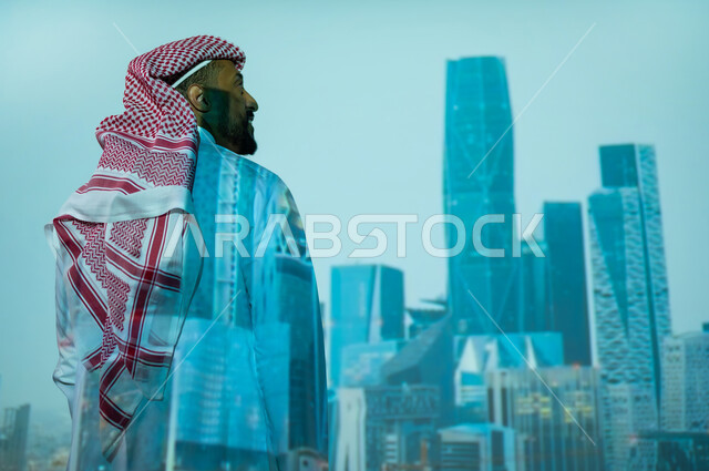 النمو والتطور العمراني في المملكة العربية السعودية, الأبراج وناطحات السحاب السكنية والتجارية في وقت الليل، رجل عربي خليجي سعودي يرتدي الثوب التقليدي يقف أمام المعالم السياحية المشهورة, مركز الملك عبد الله المالي كافد, المباني والمنشآت الاقتصادية المالية