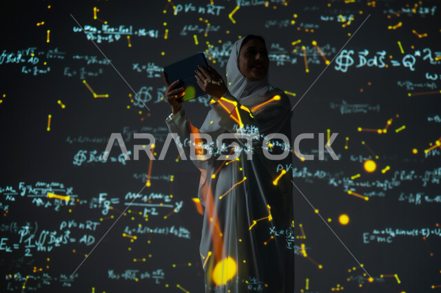 Integrating science with technology, using advanced modern technologies, a picture from the back of a smiling Saudi Gulf Arab woman, veiled and wearing an abaya, holding a tablet and looking at something, scientific and technical development in the Kingdom, numbers and calculations in mathematics, background laws and mathematical algorithms