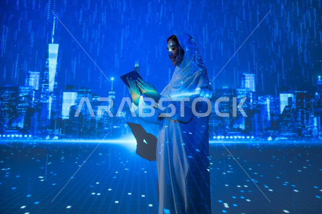 الأجواء الشتوية الماطرة فوق المدينة، استخدام التكنولوجيا الحديثة المتطورة، امرأة عربية خليجية سعودية مبتسمة محجبة ترتدي العباءة تمسك جهاز التابلت، المنشآت والأبراج  في الرياض في فصل الشتاء، الفن الهندسي المعماري للمباني وناطحات السحاب المشهورة