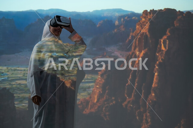 استخدام التقنيات الحديثة المتطورة، امرأة عربية خليجية سعودية مبتسمة محجبة ترتدي العباءة تضع نظارات الواقع الافتراضي، القمم والمرتفعات الجبلية، أماكن ومعالم سياحية تاريخية أثرية في محافظة العلا، التكوينات الصخرية في المناطق الصحراوية