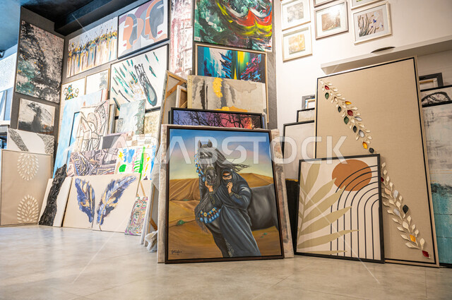 The concept of talent and creativity in drawing, a museum of creative arts, an exhibition of drawings and paintings in Saudi Arabia, hanging wall drawings, distinctive handicrafts and crafts, an artistic workshop