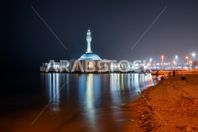 Floating mosque of Jeddah Saudi Arabia ,Creative picture of Al-Rahma Mosque and its reflection on the sea, the reflection of the lights on the sea .