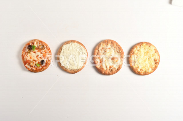 A group of delicious, quick and easy pastries or baked goods, with a variety of delicious foods, and pies stuffed with various ingredients, rich in flavors