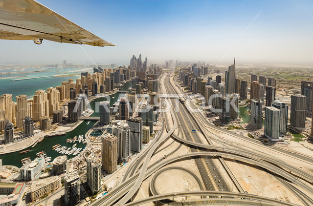 Urban growth and development on the Arabian Gulf coast, attracting and attracting tourists from all over the world, the tourist interface in the United Arab Emirates, the architectural engineering art of towers and skyscrapers.