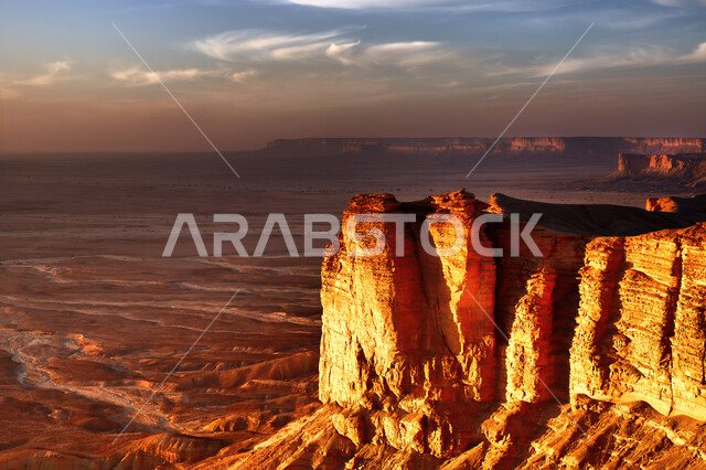 The edge of the end of the world in the city of Qiddiya, natural rock formations on the cliff of Mount Tuwaiq, mountain peaks and heights in desert areas, historical archaeological monuments, tourist places in the Kingdom of Saudi Arabia