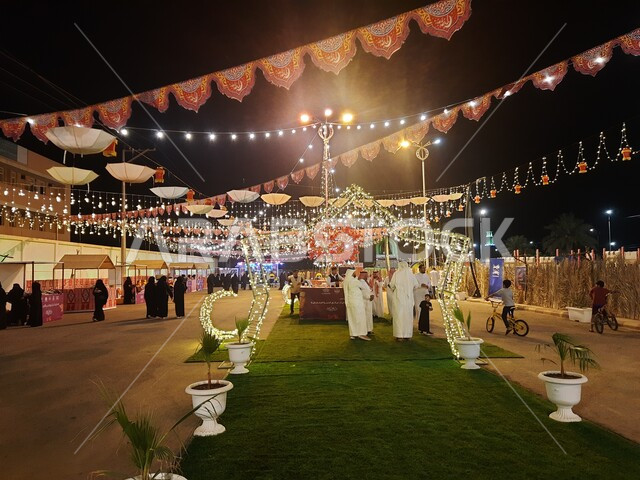Hanging decorative ropes and Ramadan accessories to celebrate the holy month, Islamic occasions and holidays, celebrations in Al-Hajra Governorate for the advent of the month of Ramadan, the value of Islamic occasions for Muslims