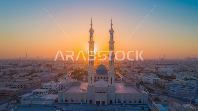 Decorations and architectural engineering designs for building mosques in the Kingdom of Saudi Arabia, minarets and domes in the modern Islamic style, getting closer to God Almighty through worship, Islamic landmarks and sacred places, a view of the sunset in the sky