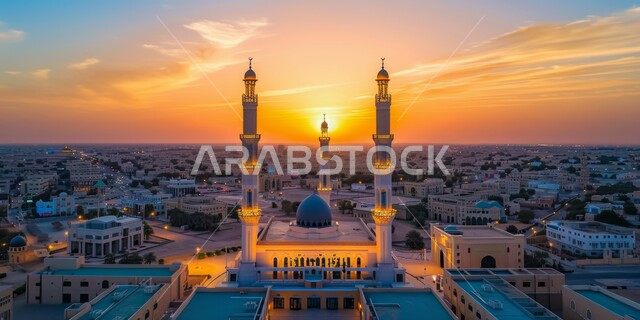 Sacred Islamic places and landmarks, architectural decorations and designs for building mosques in the Kingdom of Saudi Arabia, minarets and domes in the modern Islamic style, getting closer to God Almighty through worship, a view of the sunset in the sky