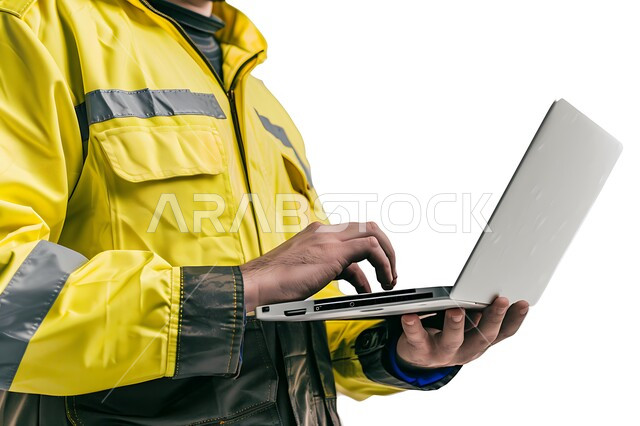 Using modern technical devices in the engineering field, close-up portrait of a Saudi Arabian Gulf engineer wearing a protective vest holding a laptop in his hand, taking care of business affairs, Saudi engineering professions and jobs, white background