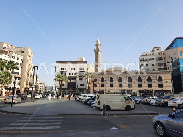 Car traffic in the streets and roads, monuments and archaeological places in the Kingdom of Saudi Arabia, heritage buildings in the Al-Balad neighborhood, interest in infrastructure, paved roads in the historic city of Jeddah