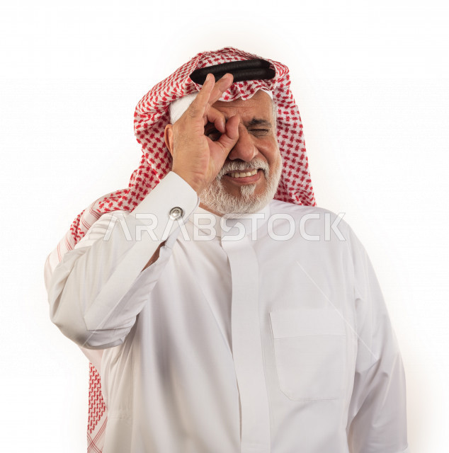 Portrait of an old Saudi Arab man with different facial and hand gestures, close-up, a Saudi young man wearing a white dress with a shemagh and headband, white background, an elderly man taking pictures with different facial expressions and body language