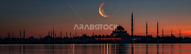 Distinctive decorations and designs in the Islamic style for domes and minarets illuminated at night, architectural engineering art for mosques, a luxurious Arab mosque, worship and getting closer to God, performing obligatory prayers and prayers, Ramadan religious backgrounds, the view of the crescent in the sky.
