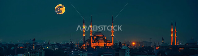 Worship and drawing closer to God Almighty, the view of the shining moon in the sky, the arrival of the month of goodness, three-dimensional illustrative designs for minarets and decorated domes of Islamic mosques, decorations and distinctive geometric designs in the blessed Ramadan, decorations for holidays and religious occasions.