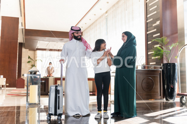 Moments when a Saudi Gulf family enters the tourist hotel , Tourism and hotel , Fun family times , Spend the most beautiful happy family times at the hotel , Happy family trip