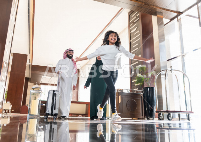 Moments when a Saudi Gulf family enters the tourist hotel , Tourism and hotel , Fun family times , Spend the most beautiful happy family times at the hotel , Happy family trip