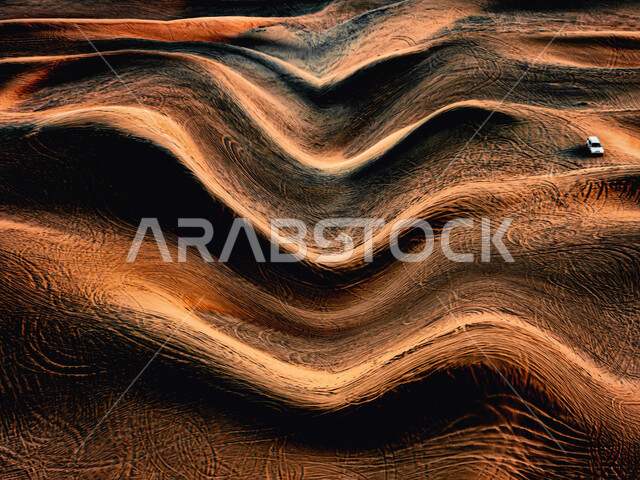 Landscape in desert environment, close-up of soft golden sand formations in Riyadh desert in Saudi Arabia, hills and sand dunes