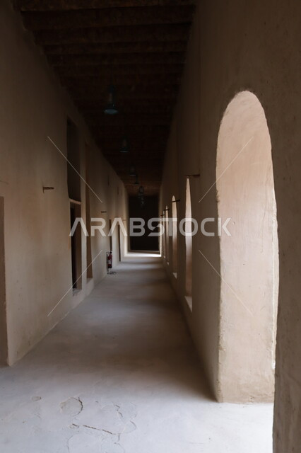 Interior architectural details of Al-Jahili Fort in Al Ain, ancient archaeological landmarks in Abu Dhabi, mud forts and castles built in the ancient style, famous landmarks and tourist places in the United Arab Emirates