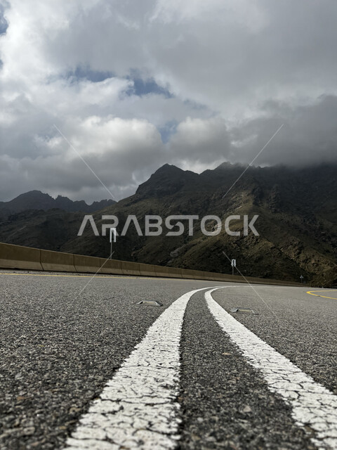 Al Shafa Mountains Highway, Paved Paths and Roads in Taif City, Mountainous Terrain and Heights, View of White Clouds in the Sky, Natural Formations and Formation of Rocks and Stones, Landmarks and Tourist Places in Saudi Arabia