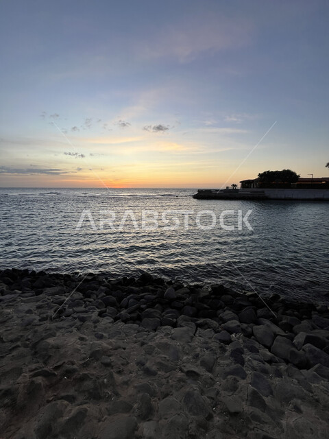 Al Rashed Beach Landscapes in the Corniche on the Red Sea coast, sunset on the rock ...