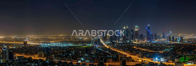 المباني والمنشآت المضاءة في الليل، حركة مرور السيارات في الشوارع ، الواجهة السياحية لجذب الزوار من أنحاء العالم, تنمية ونمو البناء الهندسي في المملكة العربية السعودية, الفن المعماري المتطور لآبراج وناطحات السحاب في الرياض, أماكن ومعالم السياحة المشهورة