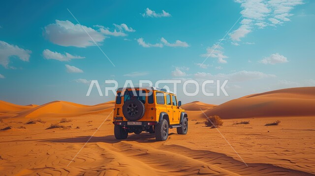 Fun desert activity, a picture from the back of a four-wheel drive vehicle in the middle of the desert, safari adventures on the sand dunes, enjoying interesting adventures, hobbies and recreational activities in the desert areas and environment in Saudi Arabia.