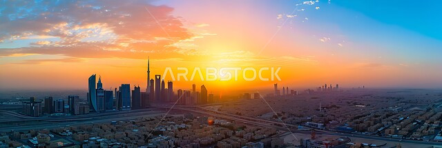 منظر تخيلي للأبراج العالية وناطحات السحاب الشامخة في المستقبل, النمو والتطور العمراني للبناء في المملكة, الفن الهندسي المعماري في تصميم الفنادق والعمارات, رؤية مستقبلية سعودية 2030, صورة بانورامية للسماء في وقت الغروب