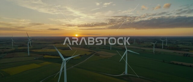 مفهوم استخدام الطاقات المتجددة صديقة البيئة، التنمية المستدامة بالطاقة البديلة في المملكة العربية السعودية، حقول توربينات الرياح وطواحين الهواء وسط الطبيعة الخضراء في المناطق الزرعية