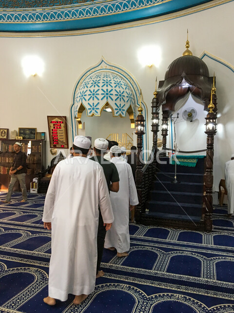 Interior decoration and design for houses of worship in the Islamic style, performing Eid prayers in the United Arab Emirates, Muslims performing Islamic holiday rituals, Ahmed Majid Al Ghurair Mosque in the Raqqa area, Eid Al Adha prayer in one of the mosques in Dubai