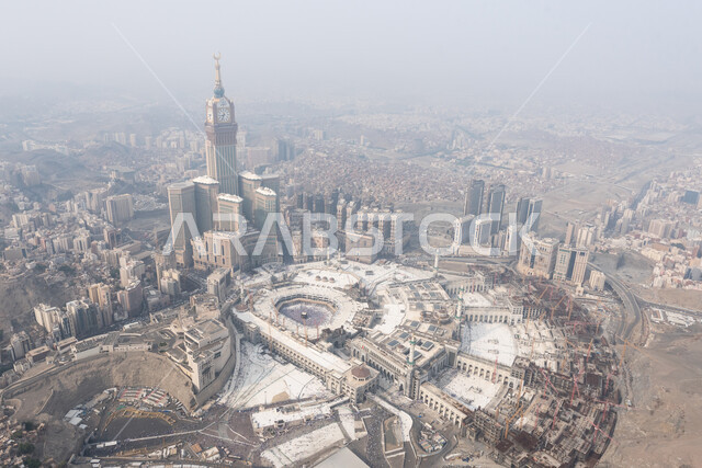 Performing Hajj and Umrah rituals, sacred Islamic religious cities and landmarks, an aerial photo of the Grand Mosque in the Holy Mosque of Mecca in Mecca in the Kingdom of Saudi Arabia, architectural engineering art in the Islamic style of domes and minarets