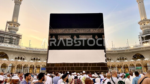 Performing Hajj and Umrah rituals, the Holy Mosque of Mecca in Mecca, the Kingdom of Saudi Arabia, Hajj season 2024, Muslim pilgrims around the Holy Kaaba in Mecca, circumambulating at sunset