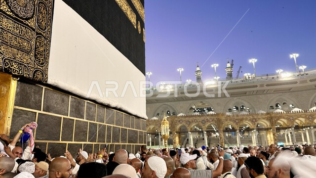 Performing Hajj and Umrah rituals, the Holy Mosque of Mecca in Mecca, Saudi Arabia, Hajj season 2024, Muslim pilgrims around the Holy Kaaba in Mecca, circumambulation at sunset