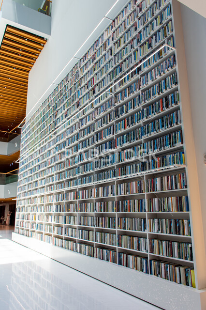 A place for readers and lovers of science and knowledge, the interior design of the bookshelves in the Mohammed bin Rashid Library, rich in magazines and dictionaries in the Emirate of Dubai, a distinguished knowledge edifice and a famous cultural landmark, a beacon of culture and thought, the architectural art of libraries, museums and exhibitions in the United Arab Emirates