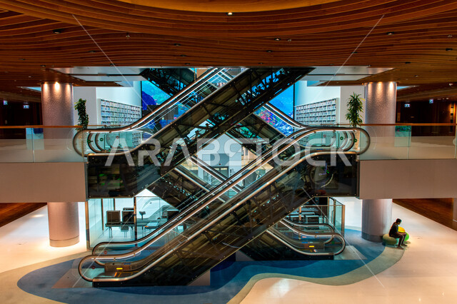 Providing comfort for readers, acquiring knowledge and developing linguistic stock, escalators in the Mohammed bin Rashid Library, rich in magazines and dictionaries in the Emirate of Dubai, scientific libraries in the United Arab Emirates, luxurious interior decorations and designs, a place for readers and lovers of science and knowledge