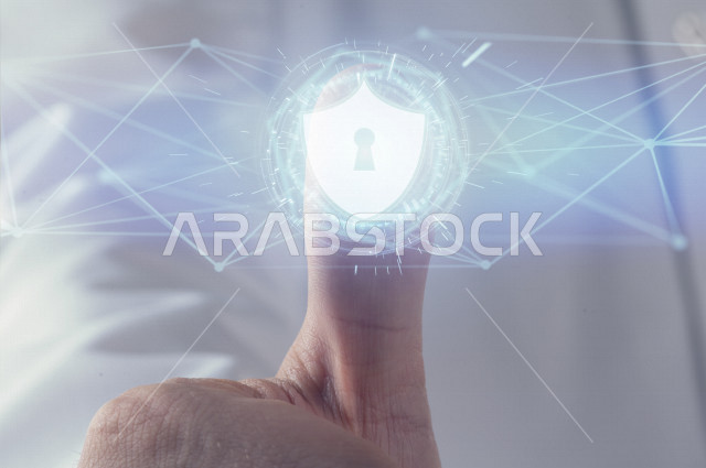 صورة مقربة ليد رجل خليجي سعودي ، يضغط بأصبع الابهام لفك قفل الامان بتقنية الهولوجرام ،استخدام خاصية الهولوجرام ثلاثية الأبعاد .