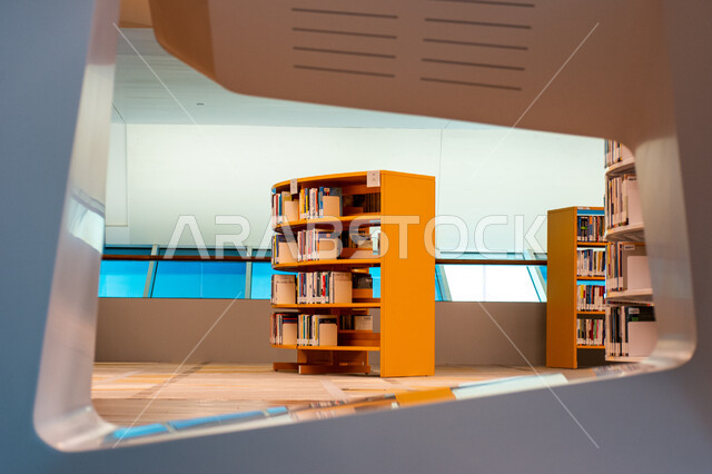 The architectural engineering art of libraries, museums and galleries in the United Arab Emirates, a beacon of culture and thought, a famous cultural landmark and a distinguished cognitive edifice, the bookshelves in the Mohammed bin Rashid Library, rich in magazines and dictionaries in the Emirate of Dubai, a place for readers and lovers of science and knowledge