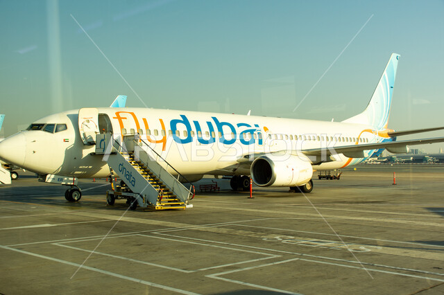 Providing advanced services for easy movement between countries, the most important air center in the Middle East, a fleet of aircraft inside Dubai International Airport, tourism in the United Arab Emirates, Emirati airlines and companies, landing and take-off runway, means of transportation and air transportation.