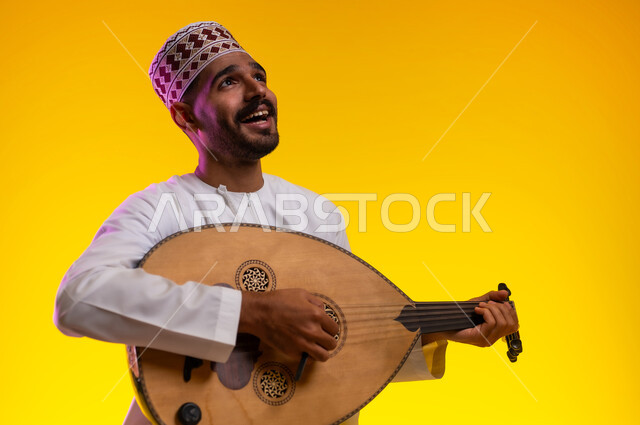 ممارسة هواية العزف على آلالات الموسيقيه، مواهب عربيه وامسيات ثقافيه، بورتريه لرجل عربي خليجي عماني يرتدي الدشداشه والكمه يعزف على آلة العود الوتريه ويقوم بتقديم البرامج الغنائيه، برامج وفنون موسيقية، فن ومسرح ، أنشطه ترفيهيه، خلفيه برتقاليه