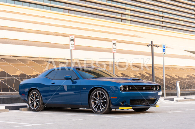 The distinguished car showroom in the United Arab Emirates, a luxury sports vehicle, vehicle events and exhibitions, a close-up of a luxury blue car parked on one of the roads in Dubai, the famous brand