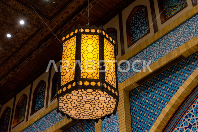 Famous tourist places and landmarks, interior designs and decorations, lighting, decorations and accessories, close-up, Ramadan lantern hanging on the ceiling, traditional metal lamp, authentic eastern Arab heritage, Ibn Battuta Mall in Dubai, United Arab Emirates