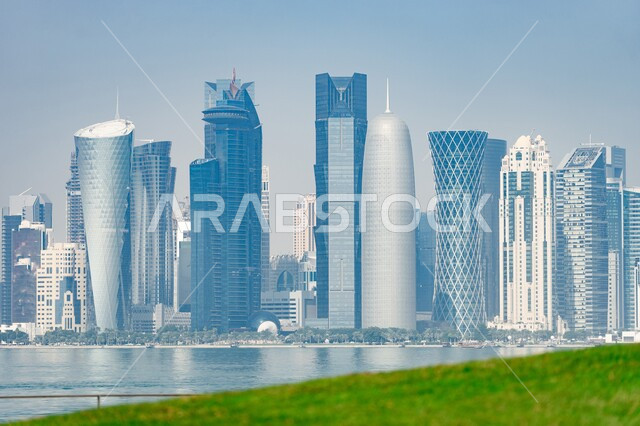 Urban growth and development in construction, the architectural engineering art of towers and skyscrapers on the Doha Corniche, the cultural renaissance in Qatar, hotels and high-rise companies with distinctive geometric shapes, and destinations that attract tourists and visitors.
