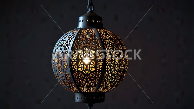 Religious antiques and accessories, celebrating the advent of the holy Ramadan, a close-up image of a metal lantern decorated with traditional designs that is illuminated at night and hung, decorations and lights for the Holy Month, lamps in the spiritual atmosphere of Ramadan, decorations and lights for Islamic occasions