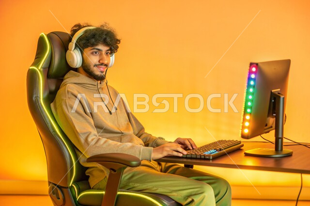 The concept of integration and interaction, a live broadcast platform in the world of video games, a portrait of a Saudi Gulf Arab young man wearing a headset working on a laptop, using modern techniques and technology, a yellow background