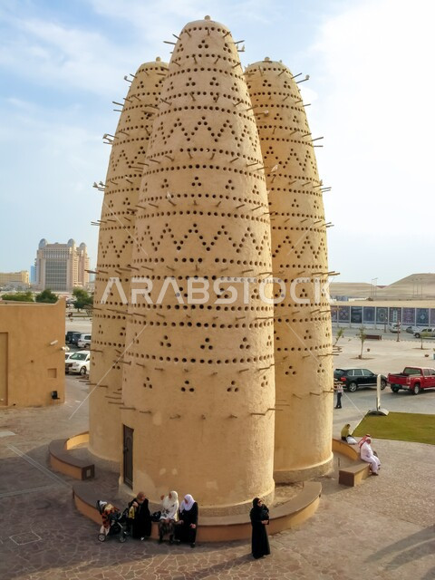 Old mud houses and houses in the State of Qatar, ancient folk architectural design, ancient villages and cities, historical popular Qatari landmarks, a concrete house in Katara Cultural Village in Doha