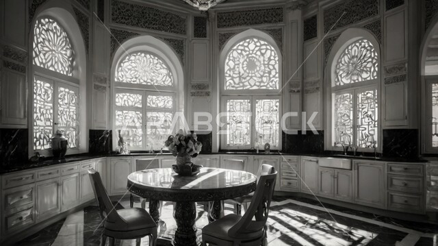 التصاميم الداخلية للفلل والشقق السكنية، الديكورات العصرية لغرف الطعام الفاخرة في المملكة العربية السعودية، صورة بالابيض والاسود لغرفة سفرة بتصاميم راقية، النوافذ والواجهات الزجاجية