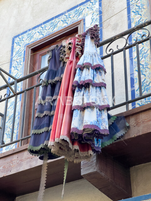 Growth and urban progress on Boulevard World in the city of Riyadh, fabrics hung on the balconies of buildings in the Kingdom of Saudi Arabia, areas that attract tourists, inscriptions and colorful decorations on the wall