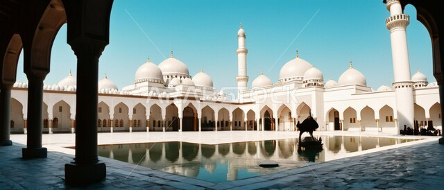 صورة لبركة ماء امام مسجد، الفن الهندسي المعماري وتصاميم الاعمدة الخارجية على الطراز العربي الاسلامي، العبادة والتقرب الى الله, الاهتمام بالمناظر العامة المحيطة بالمساجد