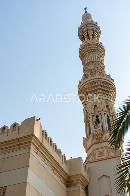 Minaret of one of the mosques in Sharjah, UAE, Islamic architecture, places of worship.